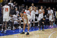 Langston players watch from the bench after their NAIA men's national championship college basketball game against Freed-Hardeman, Tuesday, March 26, 2024, in Kansas City, Mo. Freed-Hardeman won 71-67. (AP Photo/Charlie Riedel)