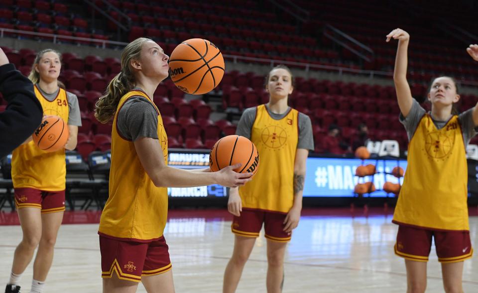 Iowa State players, from left, Ashley Joens, Emily Ryan, Denae Fritz and Aubrey Joens put up shots during an NCAA Tournament practice March 17, 2022, at Hilton Coliseum in Ames. Aubrey Joens transferred to Oklahoma after the 2021-22 season.