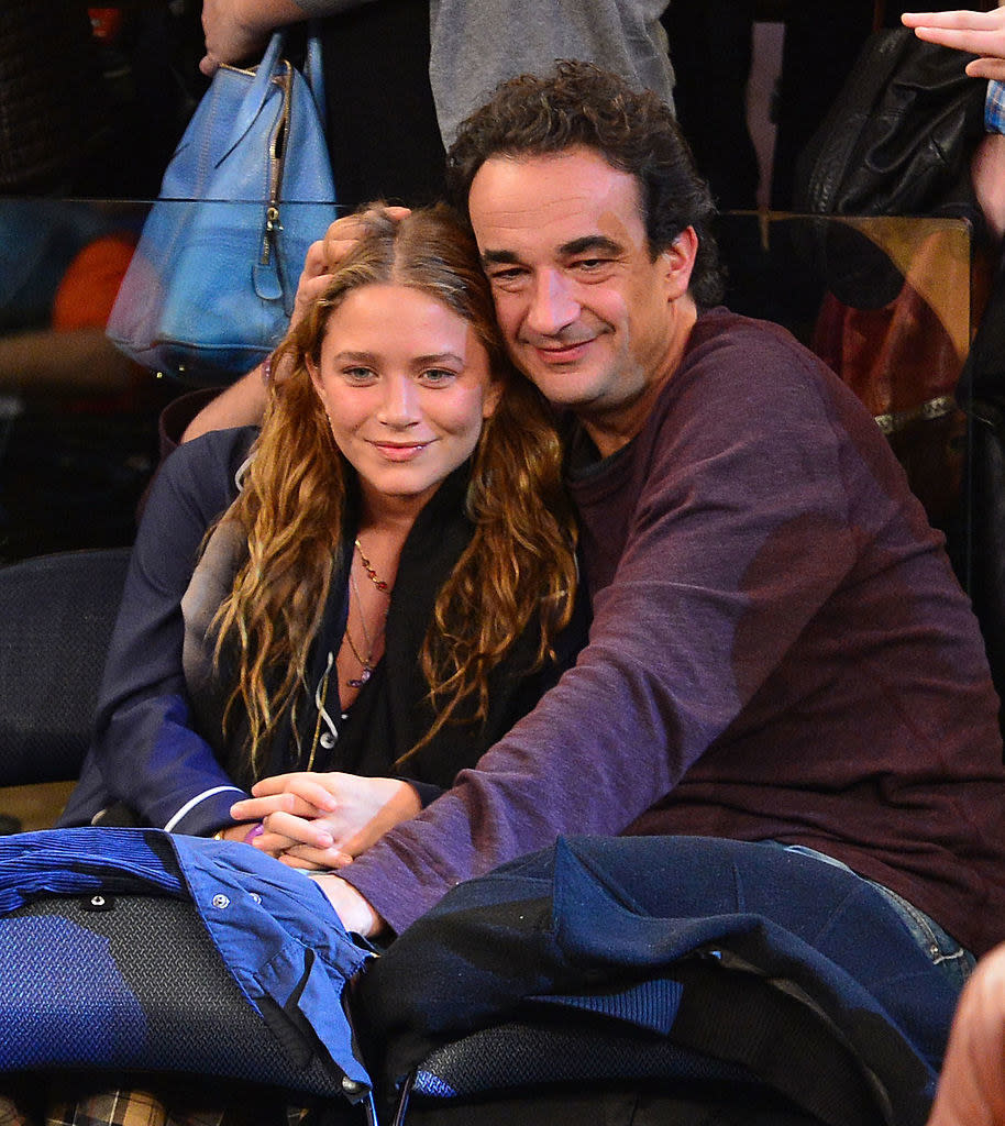 the two watching a game in the stands