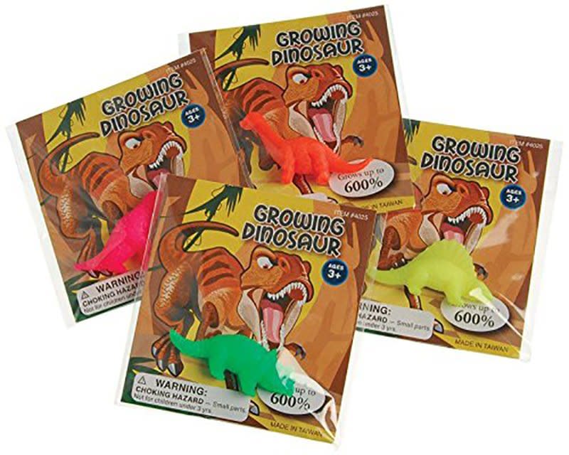 Variety of Grow Monster dinosaurs in packages