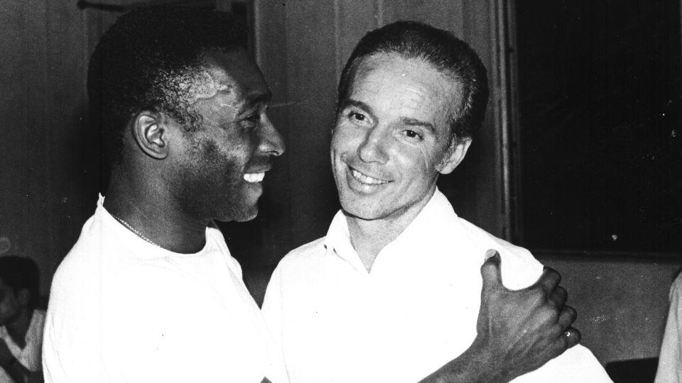 Pelé embraces Mário Zagallo after the latter's appointment as coach of the Brazilian national soccer team in March 1970. - AP