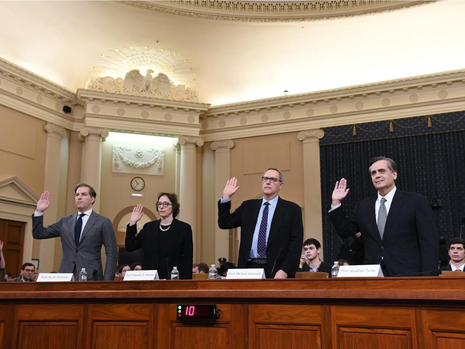 Professors Noah Feldman, left to right, Pamela S. Karlan, Michael Gerhardt, and Jonathan Turley are sworn in during a House Judiciary Committee Impeachment Inquiry hearing at the Longworth House Office Building on Wednesday December 04, 2019 in Washington, DC.