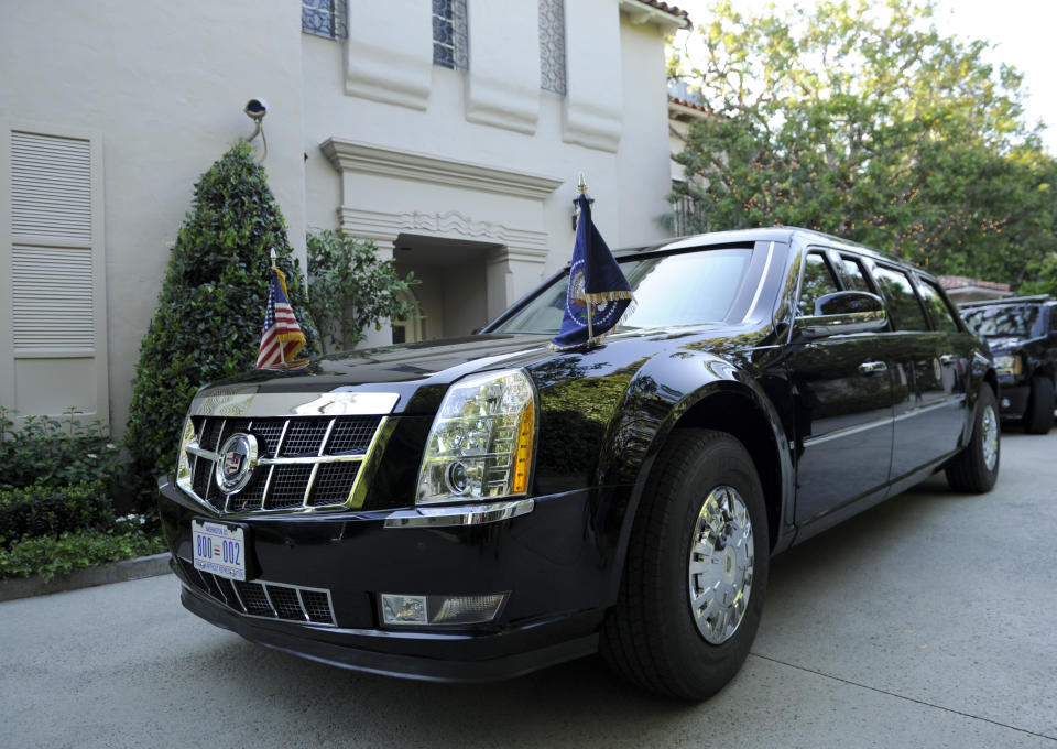 President Barack Obama's limousine is parked in front of the home Disney Studios Chairman Alan Horn and his wife Cindy in Bel Air, Calif., Wednesday, May 7, 2014. Obama is attending a Democratic party fundraiser and will later received an award from the foundation created by movie director Steven Spielberg. Obama is spending 3 days in California where he will raise money for the Democratic Party. (AP Photo/Susan Walsh)