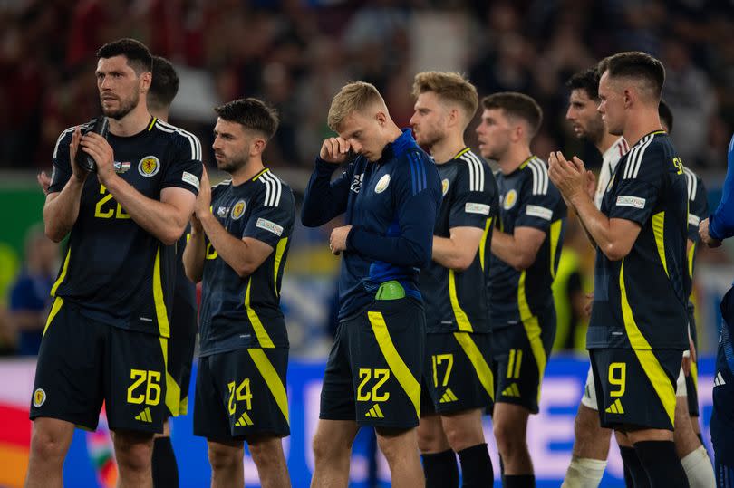 Dejected Scotland players rue another failed tournament -Credit:Visionhaus/Getty Images