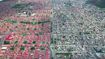 <p>Swathes of colour on the richest side in Mexico City, are a stark contrast to the blandness on the poorest side (MediaDrumWorld/Johnny Miller) </p>