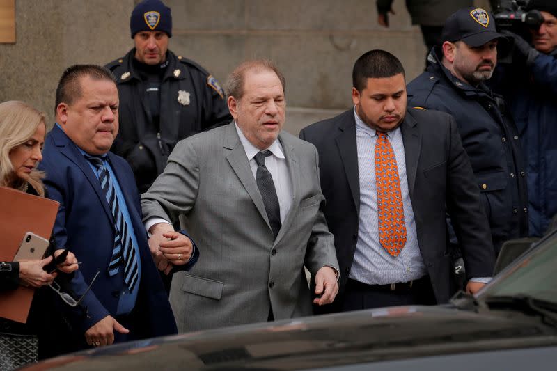FILE PHOTO: Film producer Harvey Weinstein exits following a hearing in his sexual assault case at New York State Supreme Court in New York