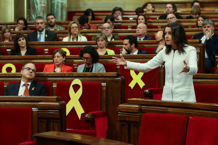 Ines Arrimadas (R), leader of Ciudadanos in Catalonia, speaks during the first session of Catalan Parliament after the regional elections in Barcelona, Spain, January 17, 2018. REUTERS/Albert Gea