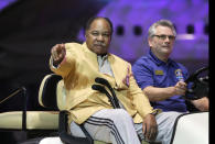 FILE - In this May 2, 2014, file photo, Bobby Mitchell is introduced before the inaugural Pro Football Hall of Fame Fan Fest at the International Exposition Center in Cleveland. Mitchell, the speedy late 1950s and ’60s NFL offensive star for the Cleveland Browns and Washington Redskins, has died. He was 84. The Pro Football Hall of Fame said Sunday night, April 5, 2020, that Mitchell’s family said he died in the afternoon. (AP Photo/Mark Duncan, File)