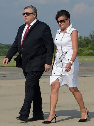 <p>MANDEL NGAN/AFP/Getty</p> Melania Trump's parents Viktor Knavs and Amalija Knavs step off off Air Force One upon arrival in Morristown, New Jersey on June 30, 2017.