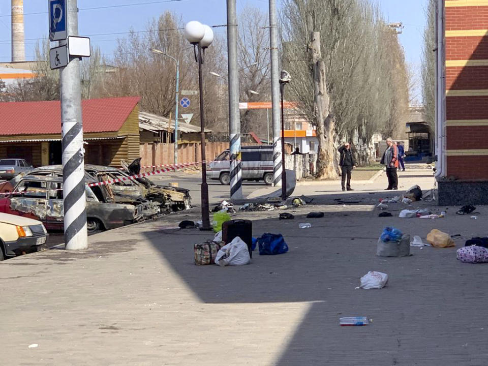 This general view shows personal belongings of victims and burnt-out vehicles after a rocket attack on the railway station in the eastern city of Kramatorsk, in the Donbass region on April 8, 2022. - More than 30 people were killed and over 100 injured in a rocket attack on a train station in Kramatorsk in eastern Ukraine, the head of the national railway company said. (Photo by Hervé BAR / AFP) (Photo by HERVE BAR/AFP via Getty Images)