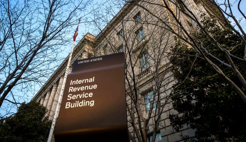 FILE - This April 13, 2014, file photo shows the Internal Revenue Service (IRS) headquarters building in Washington. The Treasury Department and the IRS are urging taxpayers who want to get their economic impact payments directly deposited to their bank accounts to enter their information online by Wednesday, May 11, 2020. The IRS said that people should use the "Get My Payment" tool on the IRS website by noon on Wednesday to provide their direct deposit information. (AP Photo/J. David Ake, File)