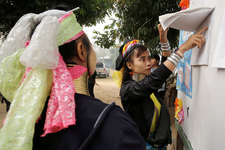 Ethnic Kayan, also known as long neck villagers arrive at the polling station in Ban Huadua school to cast their vote for the general election in Mae Hong Son, Thailand, March 24, 2019. REUTERS/Ann Wang