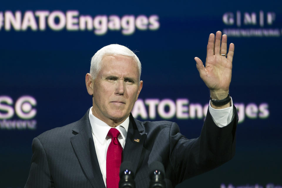 Vice President Mike Pence waves as he speaks at the Atlantic Council's "NATO Engages The Alliance at 70" conference, in Washington, Wednesday, April 3, 2019. (AP Photo/Cliff Owen)