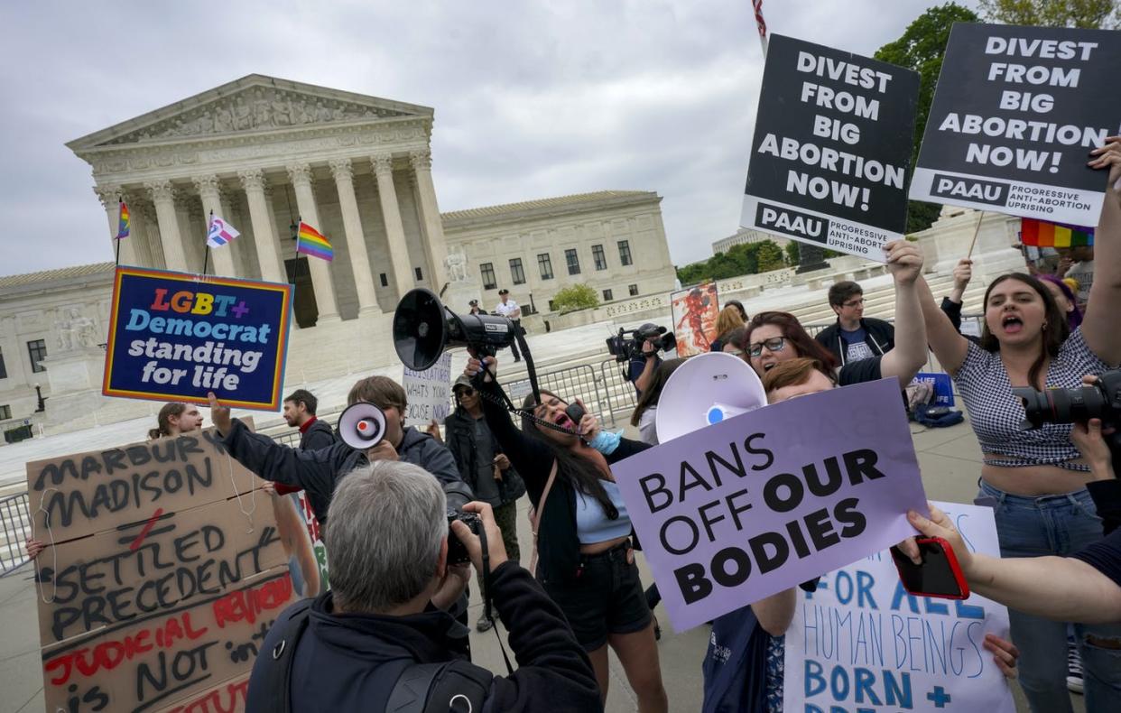 <span class="caption">Anti-abortion protesters use bullhorns to counter abortion rights advocates outside the Supreme Court on May 3, 2022. </span> <span class="attribution"><a class="link " href="https://media.gettyimages.com/photos/antiabortion-protesters-use-bull-horns-to-counter-a-gathering-of-picture-id1240434492?s=2048x2048" rel="nofollow noopener" target="_blank" data-ylk="slk:Bonnie Jo Mount/The Washington Post via Getty Images;elm:context_link;itc:0;sec:content-canvas">Bonnie Jo Mount/The Washington Post via Getty Images</a></span>