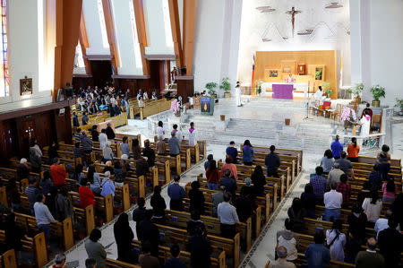 Catholics attend Mass at a church in Taipei, Taiwan March 11, 2018. REUTERS/Tyrone Siu