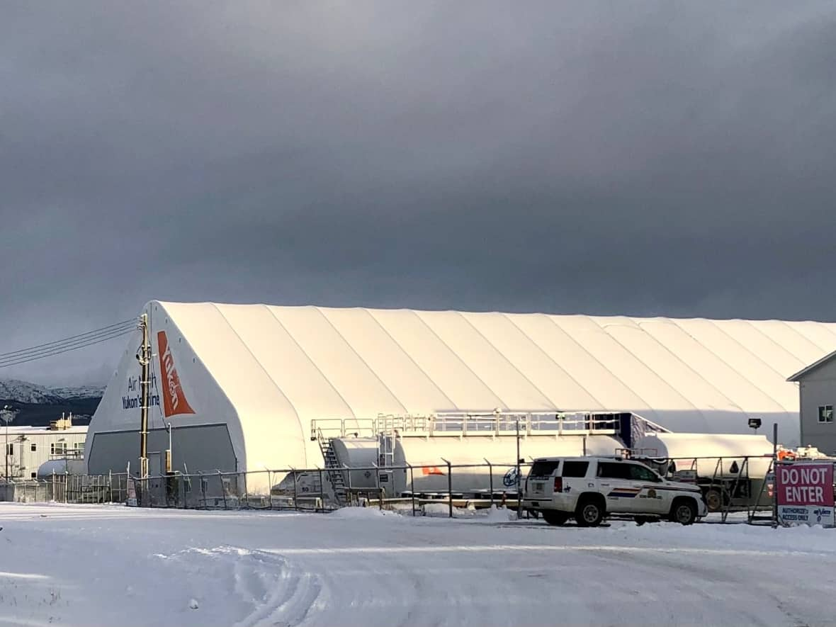 Whitehorse RCMP seen at the Air North hangar in Whitehorse on Thursday, Nov. 24, 2022. (Joseph Ho/CBC - image credit)