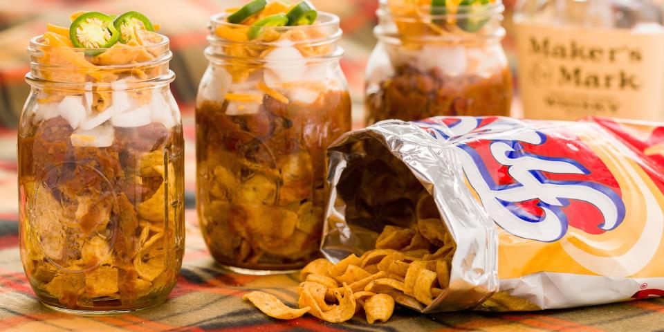 <p>Tailgating can go one of two ways: solid food spread with subs, burgers, and sides, or sad collection of stale chips and cookies. With these easy in-a-jar meals, you don't have to take the gamble. Frito pie, taco salad, and five-layer dip in a jar = touchdown. Plus, try our <span>amazing tailgate cocktails</span>!</p>