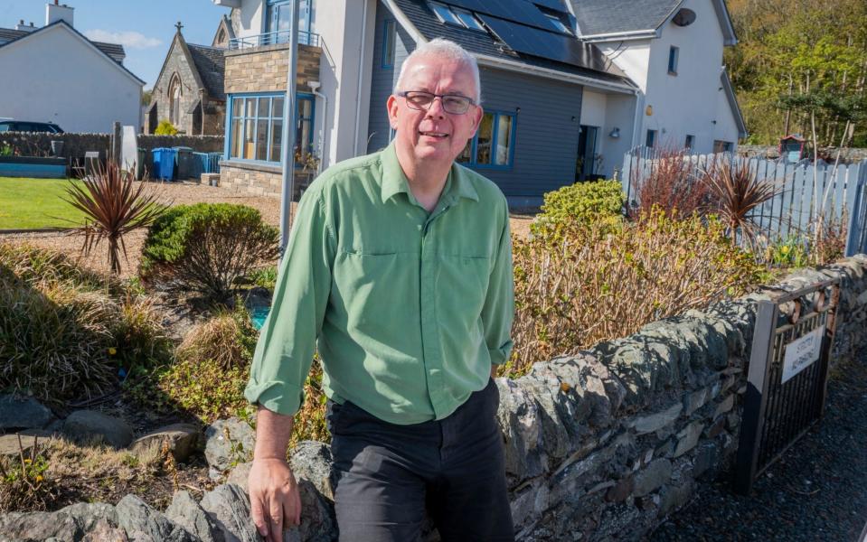 Steve Abbott in front of his net-zero home