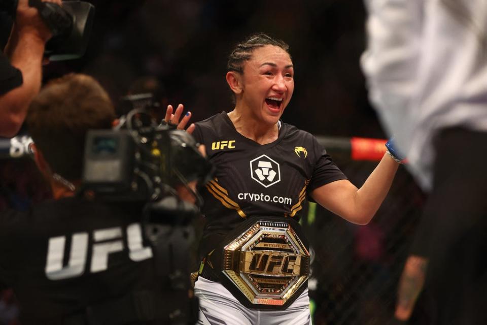 Carla Esparza celebrates becoming a two-time UFC strawweight champion (USA TODAY Sports)