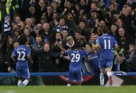 Chelsea's Samuel Eto'o (C) celebrates scoring against West Bromwich Albion during their English Premier League soccer match at Stamford Bridge in London November 9, 2013.