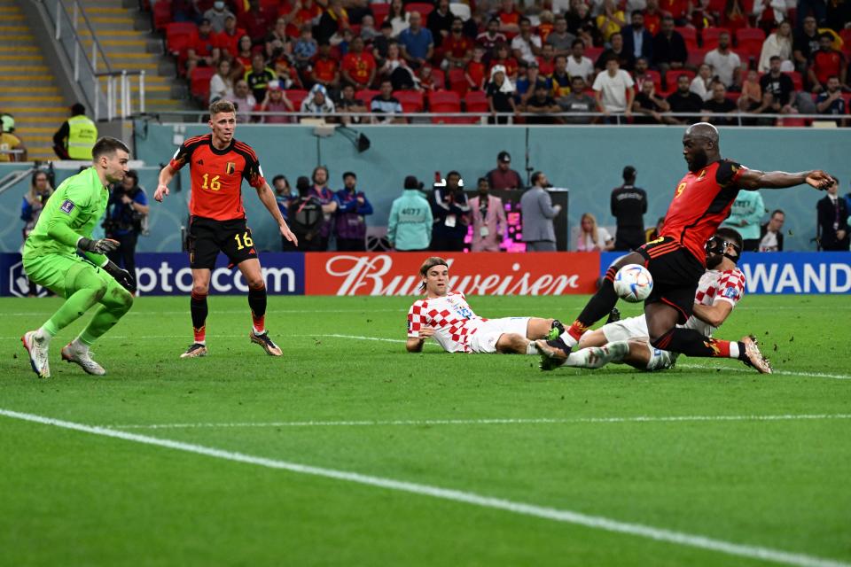 Belgium's forward #09 Romelu Lukaku (R) kicks the ball during the Qatar 2022 World Cup Group F football match between Croatia and Belgium at the Ahmad Bin Ali Stadium in Al-Rayyan, west of Doha on December 1, 2022. (Photo by Chandan KHANNA / AFP) (Photo by CHANDAN KHANNA/AFP via Getty Images)