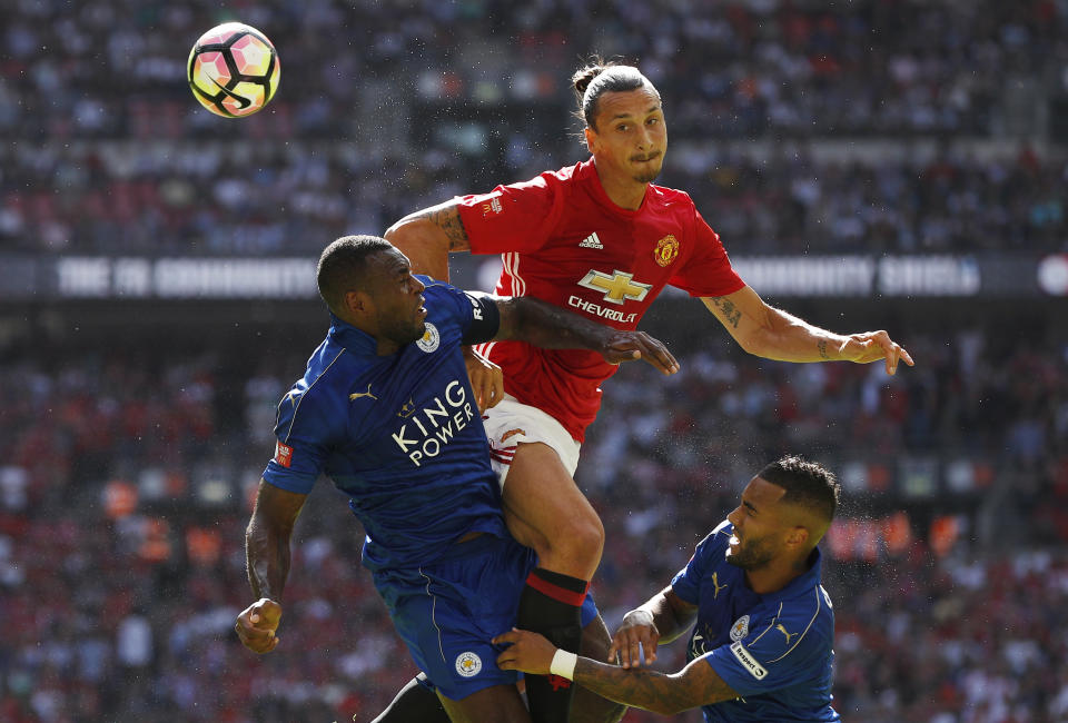 Football Soccer Britain - Leicester City v Manchester United - FA Community Shield - Wembley Stadium - 7/8/16 Manchester United's Zlatan Ibrahimovic in action with Leicester City's Danny Simpson and Wes Morgan Action Images via Reuters / John Sibley Livepic EDITORIAL USE ONLY. No use with unauthorized audio, video, data, fixture lists, club/league logos or "live" services. Online in-match use limited to 45 images, no video emulation. No use in betting, games or single club/league/player publications. Please contact your account representative for further details.