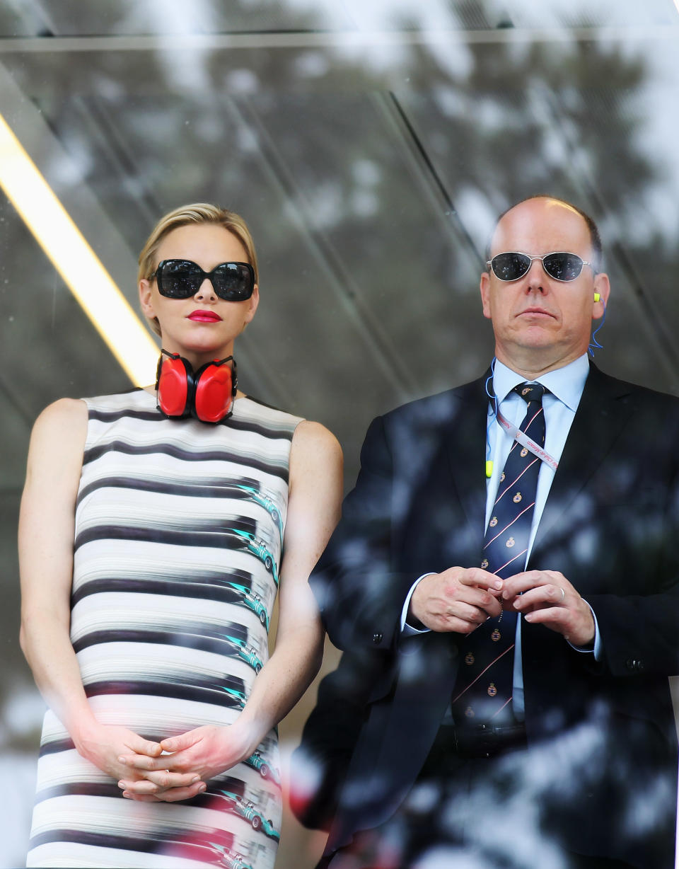 Prince Albert II of Monaco and Princess Charlene of Monaco watch from the V.I.P. suite before the Monaco Formula One Grand Prix at the Circuit de Monaco on May 27, 2012 in Monte Carlo, Monaco. (by Mark Thompson/Getty Images)