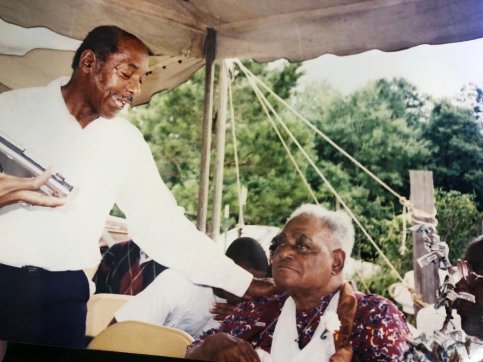 James David Causey, left, photographed with his stepfather, Orelious Pinkney, right, in this 1994 photo.