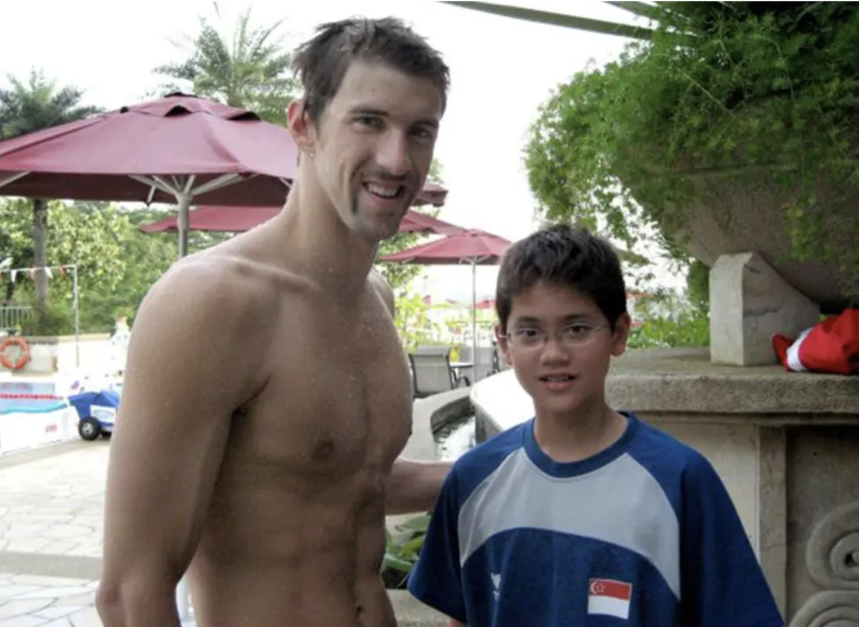 A young Joseph Schooling with Michael Phelps - eight years before pipping him to olympic glory.