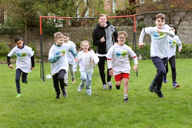 Photo showing James McClean and his six-year-old daughter Willow-Ivy who were in Dublin with AsIAm, Ireland's Autism Charity celebrating World Autism Month