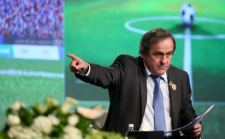 Michel Platini gives a speech in Dubai in on December 28, 2012. Football on Monday vowed to fight the scourge of match-fixing but warned a joint effort was needed to tackle the problem after police unveiled a massive criminal network that rigged hundreds of top-flight matches