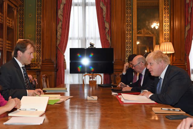 Boris Johnson meets Richard Ratcliffe. (Stefan Rousseau/PA )