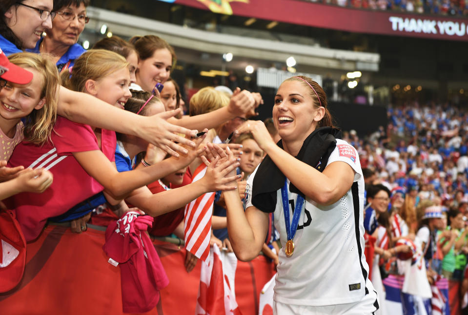 Alex Morgan led the line for both the 2015 and 2019 World Cup champion USWNTs. Which was better? (Photo by Stuart Franklin - FIFA/FIFA via Getty Images)