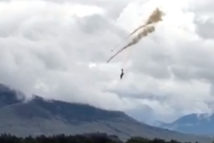 A plane of the Canadian Air Force's Snowbirds aerobatic demonstration team is seen prior crashing in Kamloops