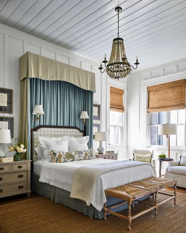 <p>Laurey W. Glenn; Styling: Buffy Hargett Miller</p> The primary bedroom, where a canopied bed is the focal point