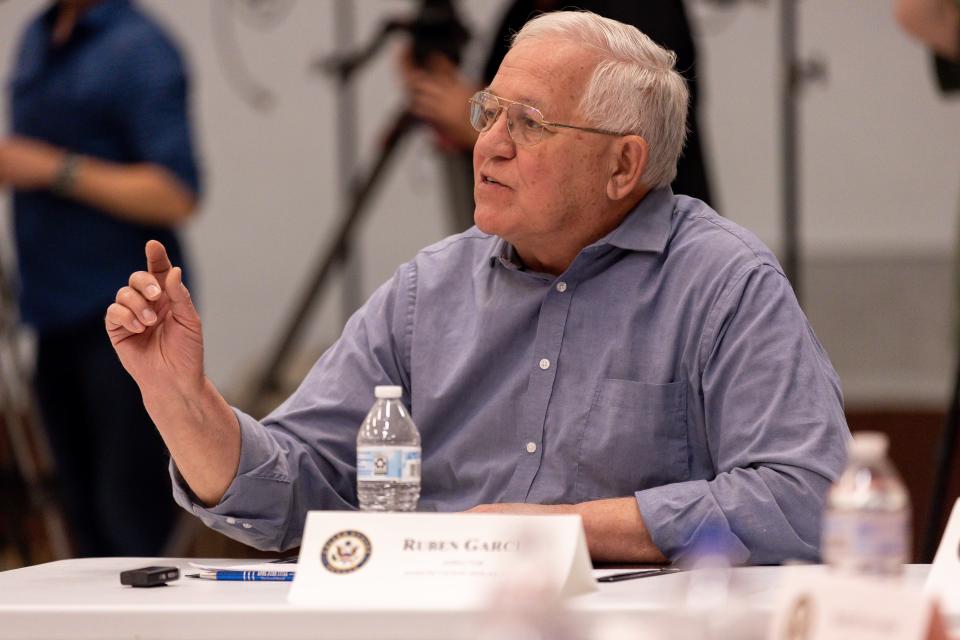 Annunciation House director Ruben García speaks at a roundtable discussion with officials from the City of El Paso, local non-profits, law enforcement officials, businesses and other stakeholders at the Emergency Migrant Operations Facility located in the recently shuttered Bassett Middle School in El Paso, Texas, on Monday, Jan 9, 2023.