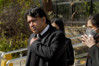 Faisal Siddiqi, a lawyer for the family of Daniel Pearl, an American reporter for the Wall Street Journal who was kidnapped and killed in Pakistan, talks to journalists after an appeal hearing in the case, at the Supreme Court, in Islamabad, Pakistan, Wednesday, Jan. 27, 2021. In a dramatic turn of events, Ahmad Saeed Omar Sheik, a man convicted and later acquitted in the 2002 murder of American journalist Daniel Pearl admitted a "minor" role in his death, upending 18 years of denials, the Pearl family lawyer said Wednesday. (AP Photo/Waseem Khan)