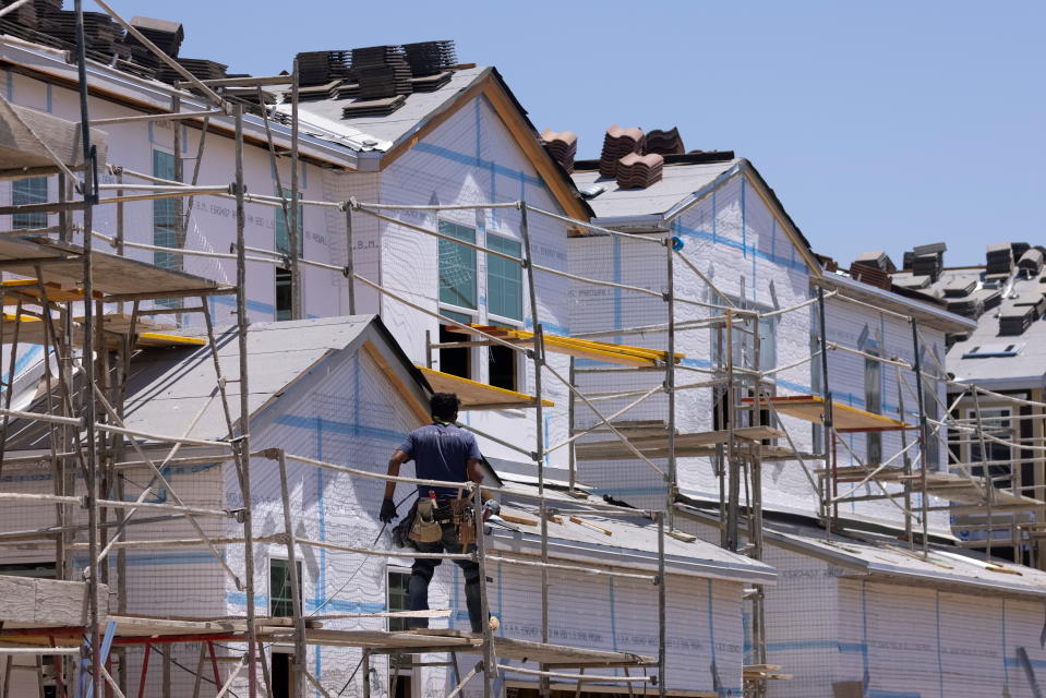 Residential single family homes construction by KB Home are shown under construction in the community of Valley Center, California, U.S. June 3, 2021.   REUTERS/Mike Blake