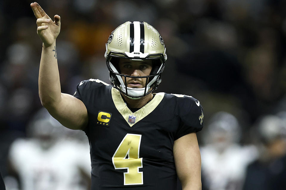 NEW ORLEANS, LOUISIANA – JANUARY 07: Derek Carr #4 of the New Orleans Saints celebrates in the first half at Caesars Superdome on January 07, 2024 in New Orleans, Louisiana. (Photo by Chris Graythen/Getty Images)