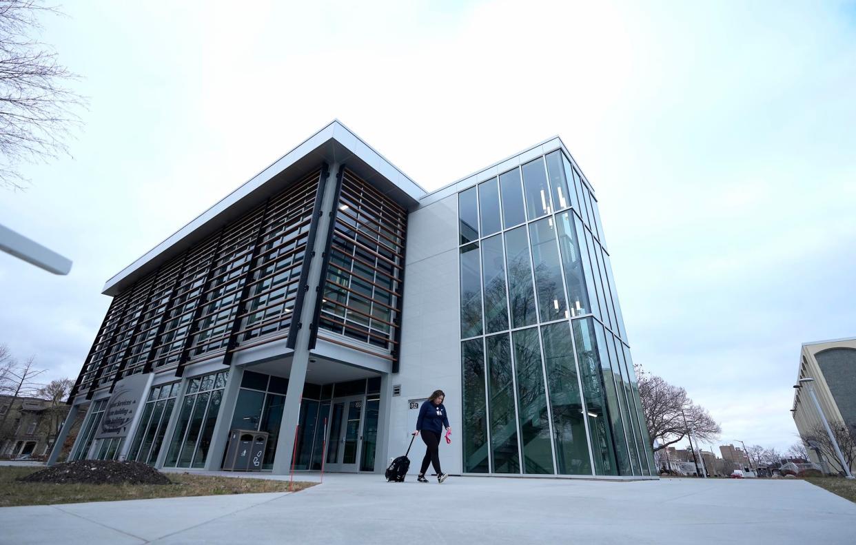 A college student leaves the Lincoln Center for Health Careers building on the Gateway Technical College campus in Racine on Thursday, Dec. 8, 2022.