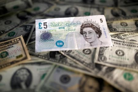 Pound slumps to 11-month low on Brexit warning