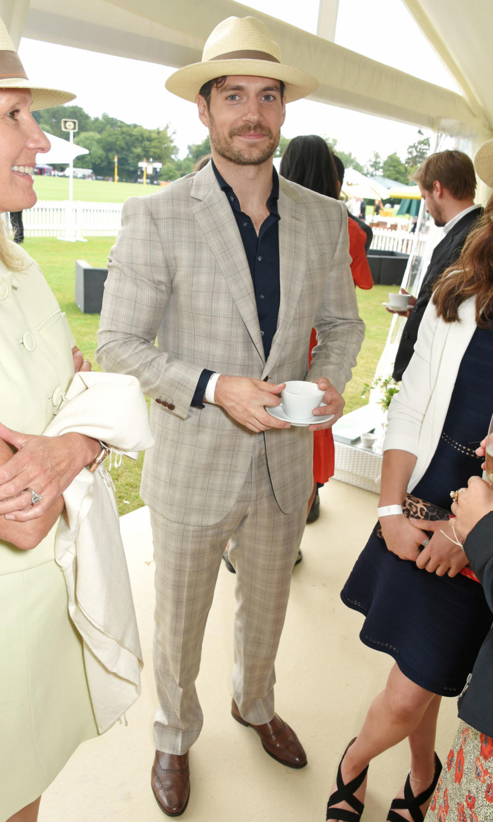 <p><strong>23 July</strong> Henry Cavill enjoyed a spot of polo wearing a checkered suit and trilby hat.</p>