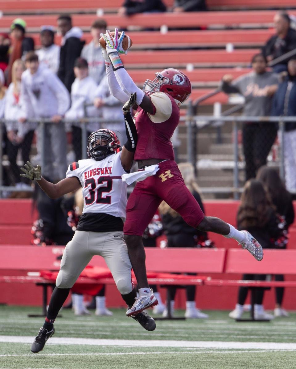 Hillsborough Thomas Amankwaa pulls in a long pass to score a first-half touchdown. Hillsborough vs. Kingsway football in South Group 5 Regional championship game at Piscataway NJ on December 4, 2021.