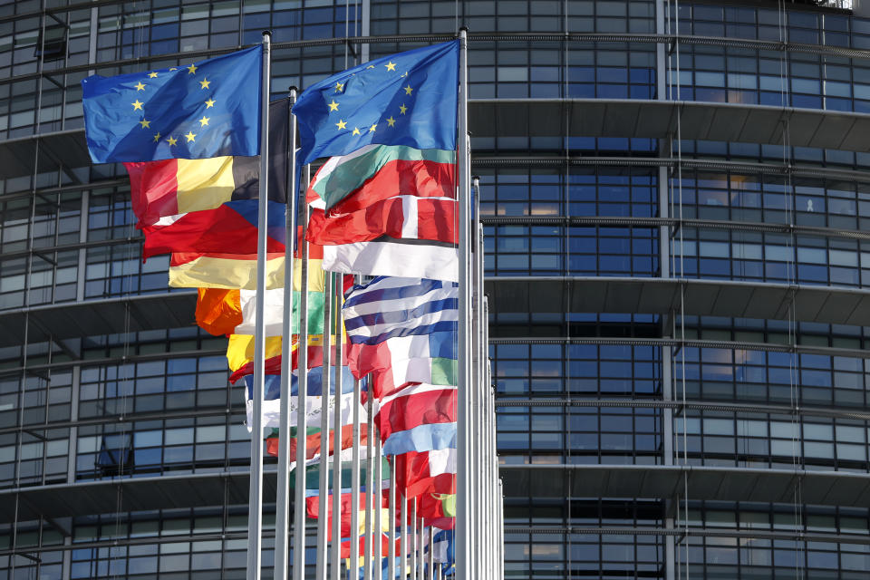 FILE - European flags fly outside the European Parliament, Tuesday, Feb.15, 2022 in Strasbourg, eastern France. In June, voters in the 27 member states of the European Union will elect their next Parliament for a five-year term. Analysts say that far-right parties, now the sixth-largest group in the assembly, are primed to gain seats – and more influence over EU policies affecting everything from civil rights to gender issues to immigration. (AP Photo/Jean-Francois Badias, File)