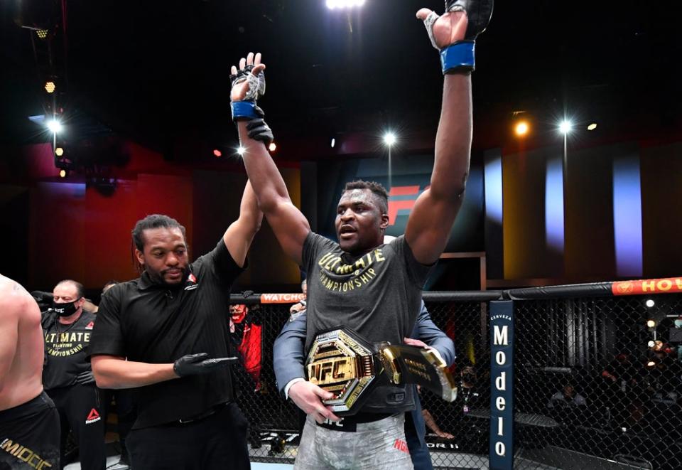 Francis Ngannou reacts after his victory over Stipe Miocic to win the UFC heavyweight championship (Getty)