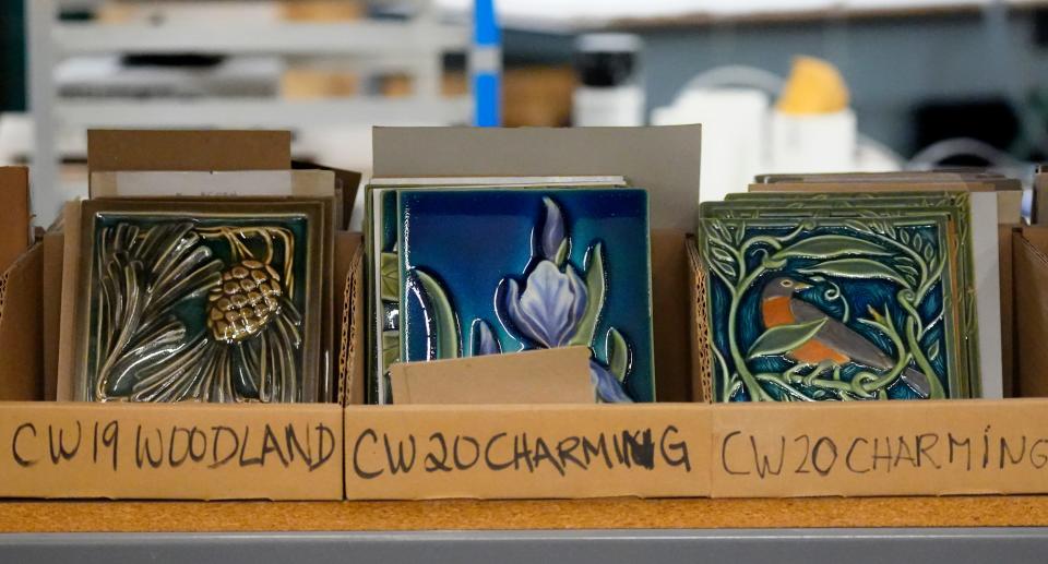 Decorative tiles at Rookwood Pottery. Each piece touches at least thirteen hands as it goes through the creative process.