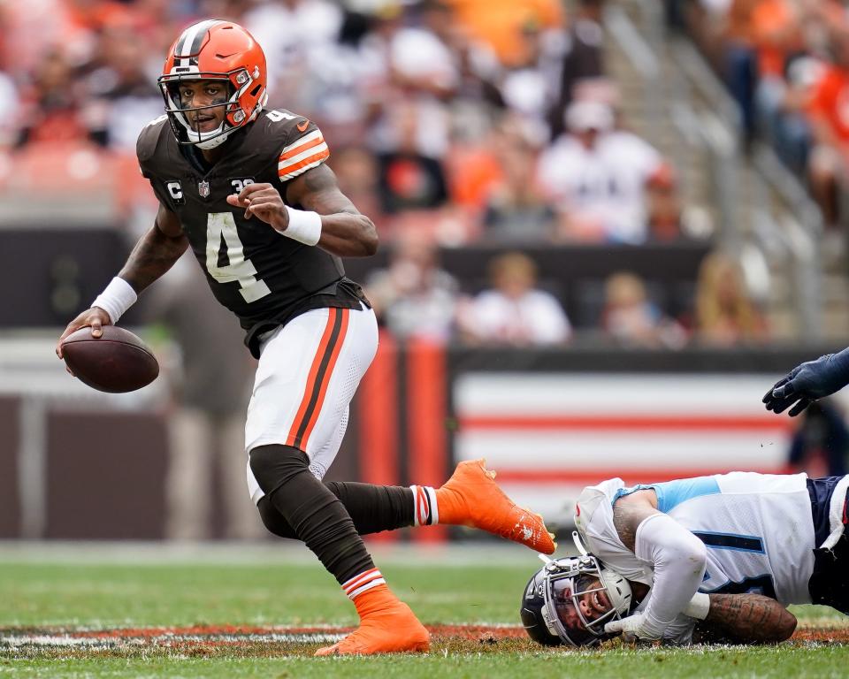 Cleveland Browns quarterback <a class="link " href="https://sports.yahoo.com/nfl/players/30125" data-i13n="sec:content-canvas;subsec:anchor_text;elm:context_link" data-ylk="slk:Deshaun Watson;sec:content-canvas;subsec:anchor_text;elm:context_link;itc:0">Deshaun Watson</a> (4) escapes from <a class="link " href="https://sports.yahoo.com/nfl/teams/tennessee/" data-i13n="sec:content-canvas;subsec:anchor_text;elm:context_link" data-ylk="slk:Tennessee Titans;sec:content-canvas;subsec:anchor_text;elm:context_link;itc:0">Tennessee Titans</a> safety <a class="link " href="https://sports.yahoo.com/nfl/players/31948" data-i13n="sec:content-canvas;subsec:anchor_text;elm:context_link" data-ylk="slk:Amani Hooker;sec:content-canvas;subsec:anchor_text;elm:context_link;itc:0">Amani Hooker</a> (37) during the second quarter in Cleveland, Ohio, Sunday, Sept. 24, 2023.