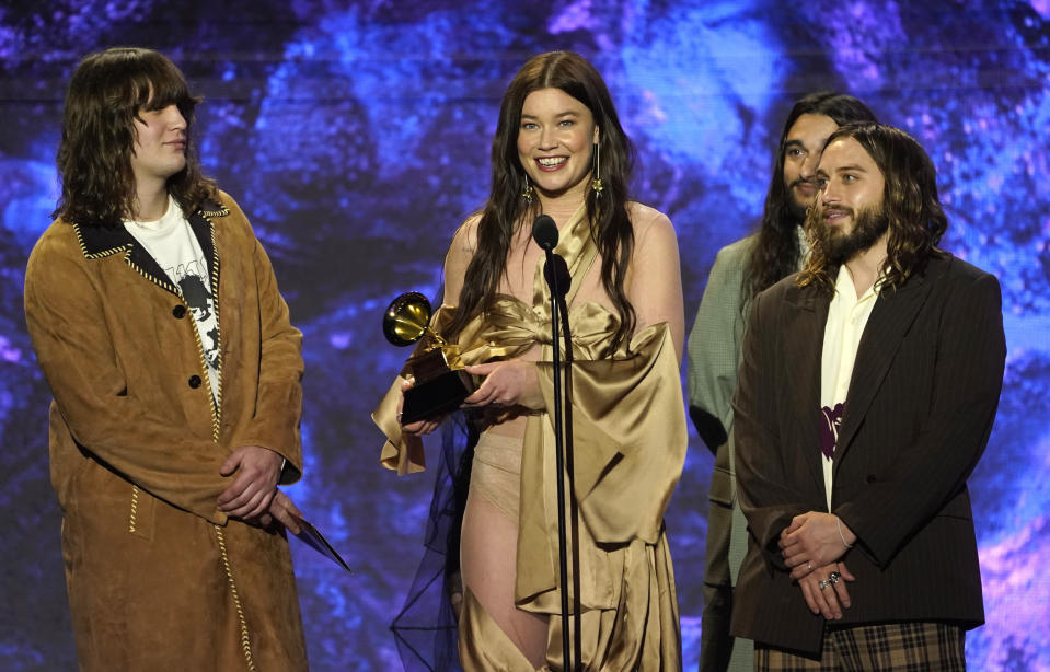 Henry Holmes, from left, Rhian Teasdale, Joshua Omead Mobaraki, and Ellis Durand of Wet Leg accept the award for best alternative music performance for "Chaise Lounge" at the 65th annual Grammy Awards on Sunday, Feb. 5, 2023, in Los Angeles. (AP Photo/Chris Pizzello)