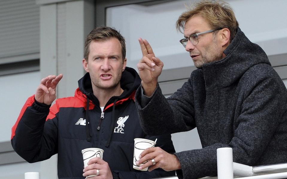 Alex Inglethorpe (left) talks to Jurgen Klopp (right) at Liverpool's academy