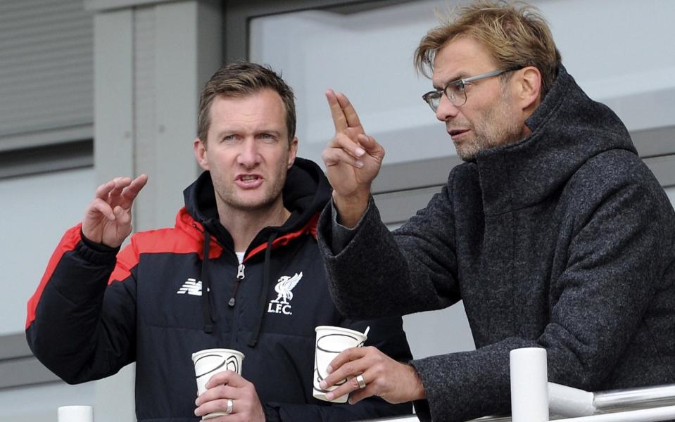 Alex Inglethorpe (left) chats with Jurgen Klopp (right) at Liverpool's academy